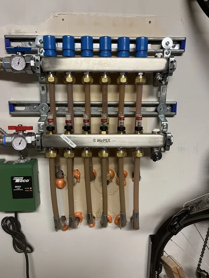 Plumber performing Water Heater Repair at a residential property in Mililani Mauka